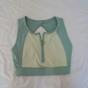 Green Dance Top, with zipper down the middle and open back.